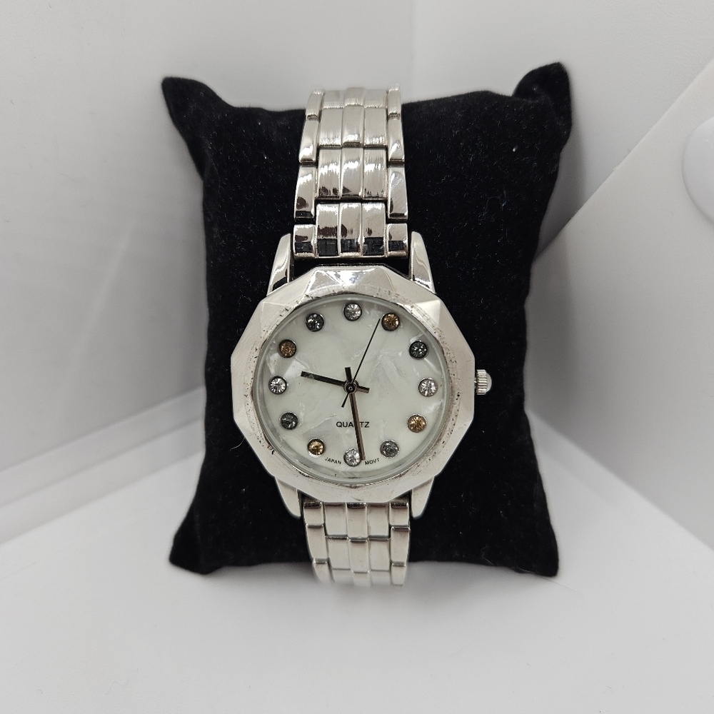 silver tone watch with rhinestone digits